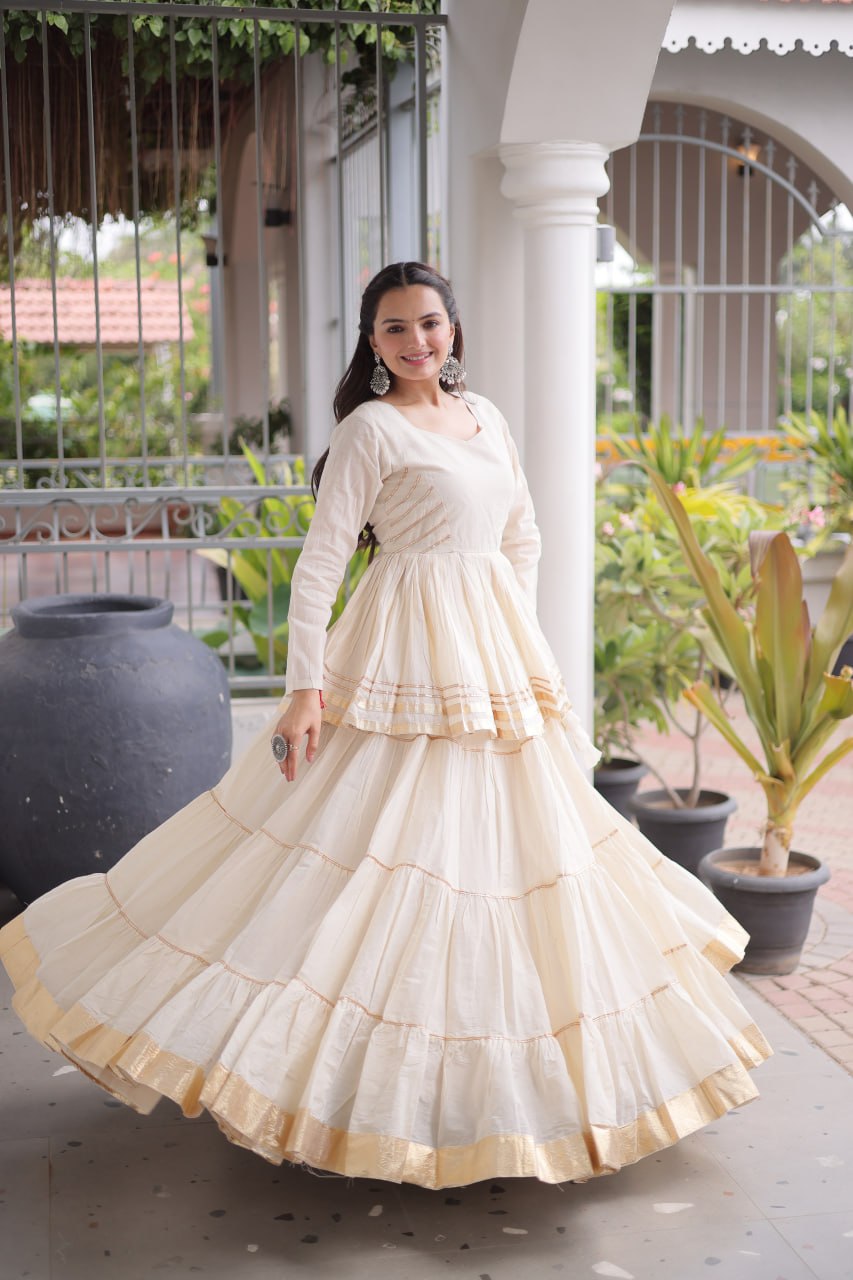 Women Designer Ivory Flared Lehenga Set with Elegant Peplum Top