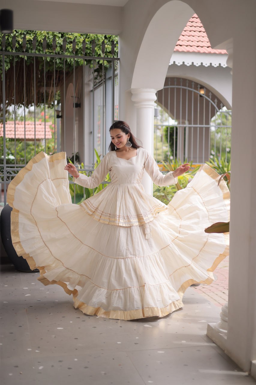 Women Designer Ivory Flared Lehenga Set with Elegant Peplum Top