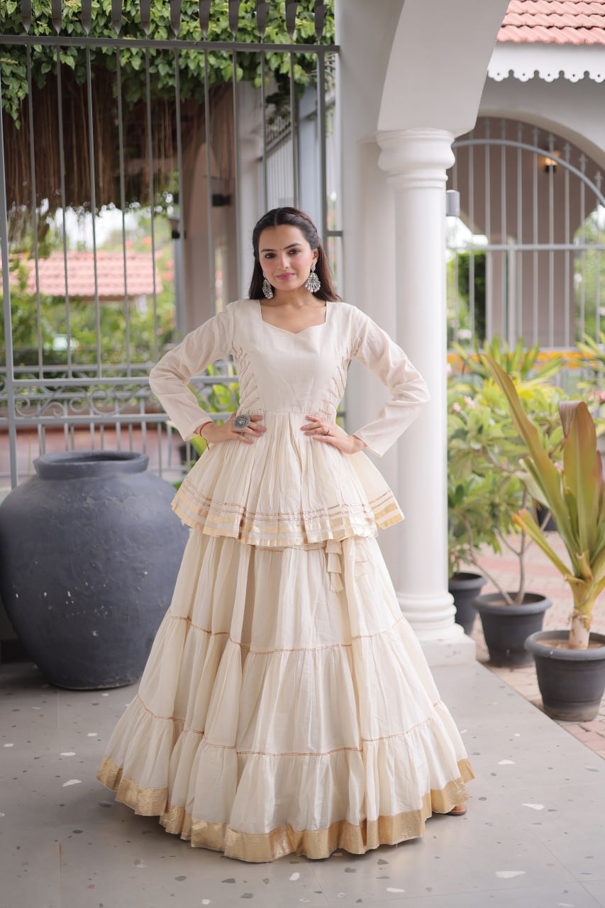Women Designer Ivory Flared Lehenga Set with Elegant Peplum Top