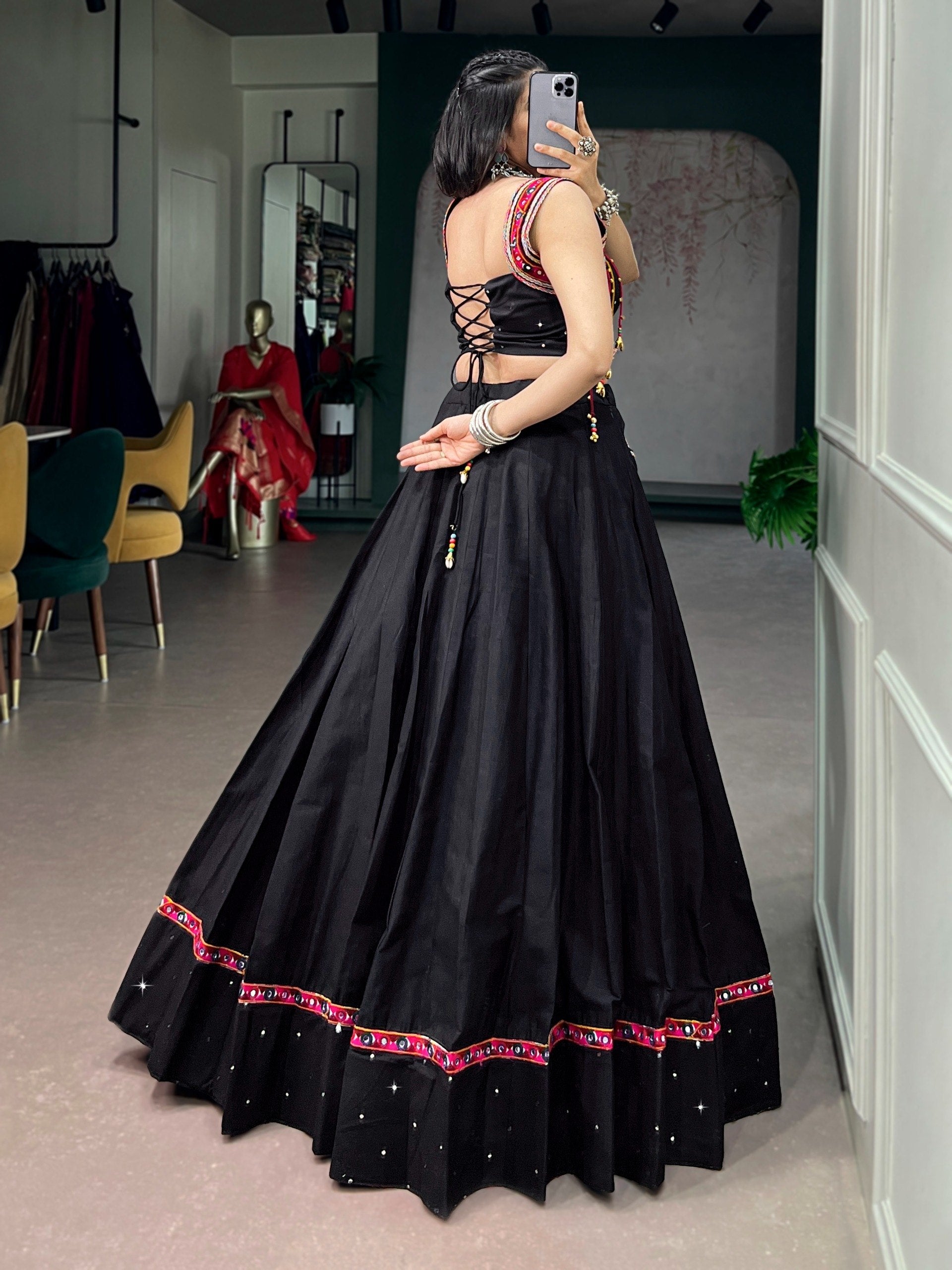 Women Designer Black Lehenga Choli with Mirror Work and Flared Silhouette